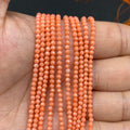 Faceted Round Coral Beads